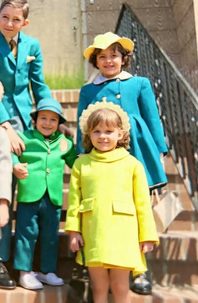 Tim, Maureen and Michael Horan with Mike on the stoop at 57 Windsor Place. Easter dress; corner-house steps.